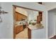 The kitchen features stainless appliances, a breakfast bar, and an adjacent dining area at 334 Northway Dr, Sun City Center, FL 33573