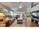 Spacious living room showcasing hardwood floors and a seamless flow to outdoor space at 334 Northway Dr, Sun City Center, FL 33573