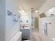 Bright bathroom with a walk-in shower, vanity, and tile floors at 4116 Diaz Ct, Hernando Beach, FL 34607