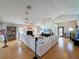 Bright living room featuring a fireplace and ample seating at 4116 Diaz Ct, Hernando Beach, FL 34607
