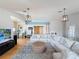 Spacious living area with barn door accent and modern lighting at 4116 Diaz Ct, Hernando Beach, FL 34607