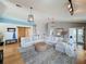 Comfortable living room showcasing a large sectional and stylish decor at 4116 Diaz Ct, Hernando Beach, FL 34607