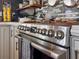 Close-up on stainless steel stove shows sleek design and modern knobs at 4116 Diaz Ct, Hernando Beach, FL 34607