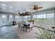 Well lit sunroom has amazing water views from every window at 4116 Diaz Ct, Hernando Beach, FL 34607