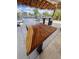 Close up of the live-edge countertop at the outdoor tiki bar overlooking the canal at 4116 Diaz Ct, Hernando Beach, FL 34607