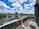 Picturesque view from the deck overlooking the tranquil waterway and neighboring waterfront residences at 4116 Diaz Ct, Hernando Beach, FL 34607
