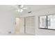 Bright bedroom with ample closet space and natural light from the window at 456 Lakeview Dr # 5, Palm Harbor, FL 34683