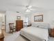 Bright bedroom with a comfortable bed, classic furnishings, and soft, neutral decor at 456 Lakeview Dr # 5, Palm Harbor, FL 34683