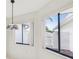 Bright breakfast nook with natural light shining through two large windows at 456 Lakeview Dr # 5, Palm Harbor, FL 34683