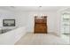 Dining room features a wooden china cabinet and chandelier at 456 Lakeview Dr # 5, Palm Harbor, FL 34683
