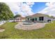 The backyard is an oasis with a pool, spa, gazebo and lush landscaping at 5189 Brackenwood Dr, Spring Hill, FL 34609