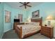 Cozy bedroom features wood furnishings and nautically themed decor for a beach-inspired retreat at 530 S Gulfview Blvd # 303, Clearwater, FL 33767