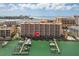 Exterior shot of building with convenient boat docks, providing easy access to the water at 530 S Gulfview Blvd # 303, Clearwater, FL 33767