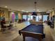 Community game room with pool table, bar, and seating area at 530 S Gulfview Blvd # 303, Clearwater, FL 33767