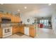 Well-equipped kitchen with ample counter space, wooden cabinets, and modern appliances for convenient meal preparation at 530 S Gulfview Blvd # 303, Clearwater, FL 33767