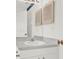 Bathroom features a white vanity with a single sink and unique shutter-style decor at 5400 9Th N Ave, St Petersburg, FL 33710