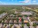 Property location aerial view showcasing convenient access to community amenities, roadways, and serene landscape at 5717 Kingletsound Pl, Lithia, FL 33547