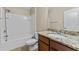 Cozy bathroom with tub, shower, single sink vanity, and tile flooring at 5717 Kingletsound Pl, Lithia, FL 33547