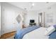 Bedroom featuring a ceiling fan, television and en-suite bathroom at 6 Academy S Way # 23A, St Petersburg, FL 33711