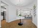 Welcoming foyer with view of the kitchen and dining room, tile floors, and elegant decor at 6 Academy S Way # 23A, St Petersburg, FL 33711