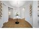 Spacious foyer with decorative lighting, tiled floors, and neutral decor at 6 Academy S Way # 23A, St Petersburg, FL 33711