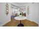 Beautiful foyer featuring a tile floor and a view of the dining room at 6 Academy S Way # 23A, St Petersburg, FL 33711