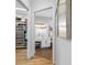 Bright hallway offering views of the closet and a well-lit bathroom at 6 Academy S Way # 23A, St Petersburg, FL 33711