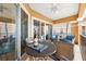 Relaxing covered patio featuring comfortable seating, perfect for enjoying a glass of wine at 6 Academy S Way # 23A, St Petersburg, FL 33711