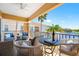 Enjoy the covered patio featuring views of the waterfront and comfortable seating at 6 Academy S Way # 23A, St Petersburg, FL 33711