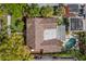 Aerial view of the house, roof, pool, and backyard at 646 16Th Ne Ave, St Petersburg, FL 33704