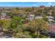 Aerial view of a home with mature trees and in proximity to the ocean at 646 16Th Ne Ave, St Petersburg, FL 33704