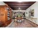 Formal dining room featuring dark wood furniture, decorative mirrors, and built-in china cabinet at 646 16Th Ne Ave, St Petersburg, FL 33704