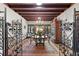 Formal dining room featuring dark wood furniture, chandelier lighting, and beautiful iron gate entrance at 646 16Th Ne Ave, St Petersburg, FL 33704