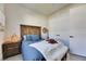 Comfortable bedroom with accent lighting and a faux fur throw at 706 Manns Harbor Dr, Apollo Beach, FL 33572