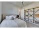 Inviting bedroom with shelving and natural light at 706 Manns Harbor Dr, Apollo Beach, FL 33572
