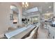 Open dining room flows into a spacious living area, with views of the kitchen and outdoor space at 706 Manns Harbor Dr, Apollo Beach, FL 33572