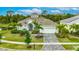 Charming single-Gathering home with a well-manicured lawn, beautiful landscaping and paved driveway at 706 Manns Harbor Dr, Apollo Beach, FL 33572