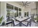 Outdoor patio area with seating and an outdoor kitchen at 706 Manns Harbor Dr, Apollo Beach, FL 33572