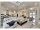 Open-concept living area with seamless flow between living, dining, and kitchen creates a spacious and inviting atmosphere at 706 Manns Harbor Dr, Apollo Beach, FL 33572