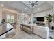 Bright living room with bar seating, tall ceilings, and open floor plan perfect for entertaining at 706 Manns Harbor Dr, Apollo Beach, FL 33572