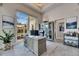 Well-lit home office featuring a view of the lanai, perfect for a productive workspace at 706 Manns Harbor Dr, Apollo Beach, FL 33572