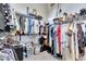 Large walk-in closet with plenty of shelves for optimized storage solutions at 706 Manns Harbor Dr, Apollo Beach, FL 33572