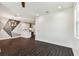 A modern living room features an open concept floor plan with sleek flooring and contemporary lighting at 7113 S Mascotte St, Tampa, FL 33616