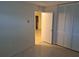 Bright bedroom with closet offers a clean and inviting space with neutral tones and natural light at 754 71St N Ave, St Petersburg, FL 33702
