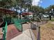 Covered community playground offers a safe and shaded play space for children at 754 71St N Ave, St Petersburg, FL 33702