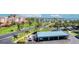 Well maintained parking area shaded by palm trees and lush landscaping in Florida at 7872 Sailboat Key S Blvd # 404, South Pasadena, FL 33707