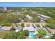 Residential neighborhood with tree-lined streets and access to community amenities, near the beach at 827 Virginia St, Dunedin, FL 34698