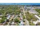 Aerial view of residential area with access to highways and a vibrant commercial district close to the water at 827 Virginia St, Dunedin, FL 34698