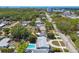 Aerial view of neighborhood showcasing community and proximity to urban areas at 827 Virginia St, Dunedin, FL 34698