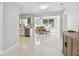 Open floor plan showcases kitchen, dining area, and seamless flow for entertaining at 827 Virginia St, Dunedin, FL 34698